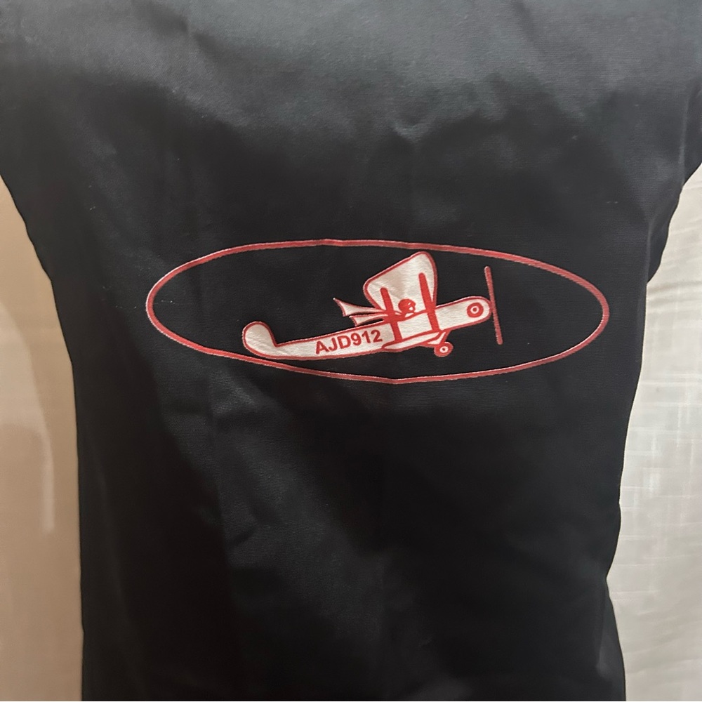 KNG apron with airplane graphic